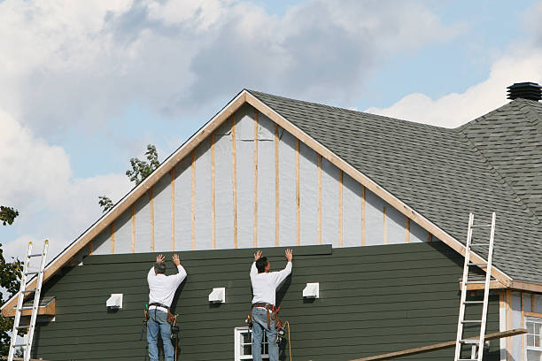 Professional Storm Damage Siding Repair technician working in Church Hill, MD